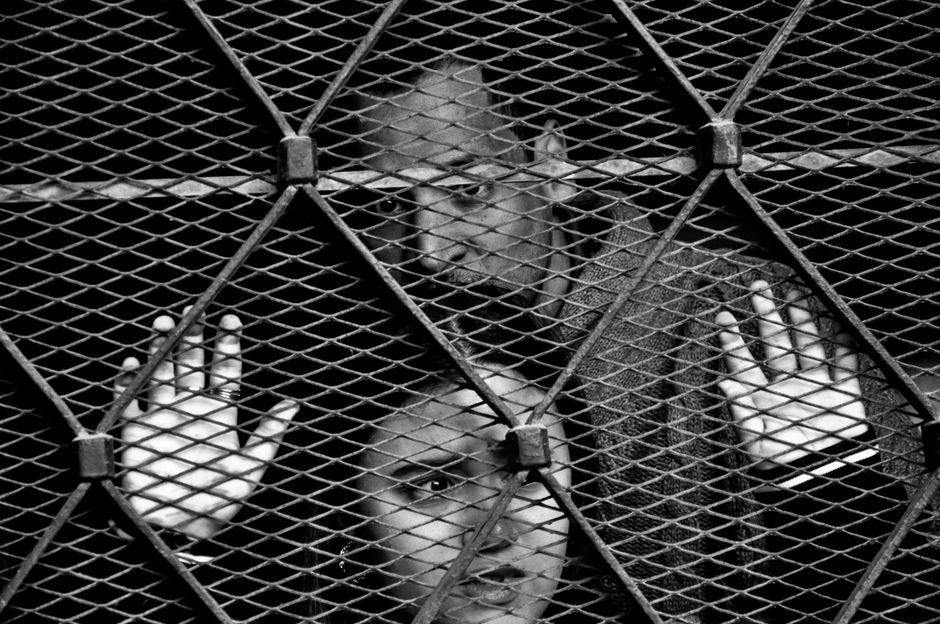 Geschäftsmann hinter Gittern